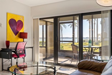 Enjoy panoramic vistas of the glistening bay from your private on Isla Del Sol Yacht and Country Club in Florida - for sale on GolfHomes.com, golf home, golf lot