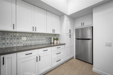 Discover the perfect blend of modern comfort and natural beauty on Leisure World Seal Beach Golf Course in California - for sale on GolfHomes.com, golf home, golf lot