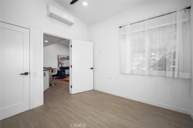 Discover the perfect blend of modern comfort and natural beauty on Leisure World Seal Beach Golf Course in California - for sale on GolfHomes.com, golf home, golf lot