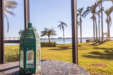 Enjoy panoramic vistas of the glistening bay from your private on Isla Del Sol Yacht and Country Club in Florida - for sale on GolfHomes.com, golf home, golf lot