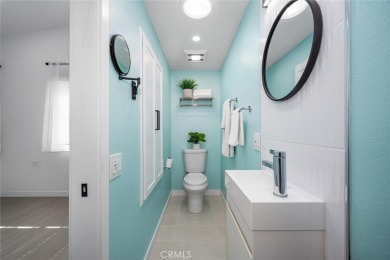 Discover the perfect blend of modern comfort and natural beauty on Leisure World Seal Beach Golf Course in California - for sale on GolfHomes.com, golf home, golf lot