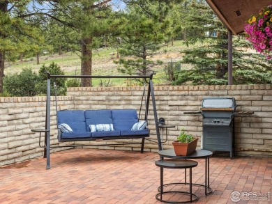 Easy living at Vista Lane! Drop off your groceries & hit the on Lake Estes Golf Course in Colorado - for sale on GolfHomes.com, golf home, golf lot