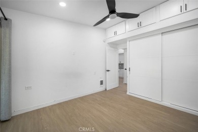 Discover the perfect blend of modern comfort and natural beauty on Leisure World Seal Beach Golf Course in California - for sale on GolfHomes.com, golf home, golf lot