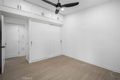 Discover the perfect blend of modern comfort and natural beauty on Leisure World Seal Beach Golf Course in California - for sale on GolfHomes.com, golf home, golf lot
