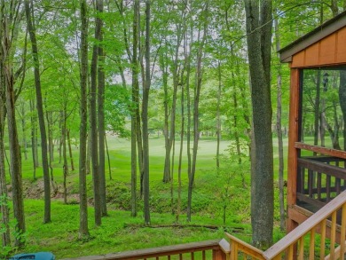 Welcome to 'Putter's Paradise', a delightful cabin nestled in on Alpine Lake Resort in West Virginia - for sale on GolfHomes.com, golf home, golf lot