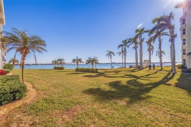 Enjoy panoramic vistas of the glistening bay from your private on Isla Del Sol Yacht and Country Club in Florida - for sale on GolfHomes.com, golf home, golf lot