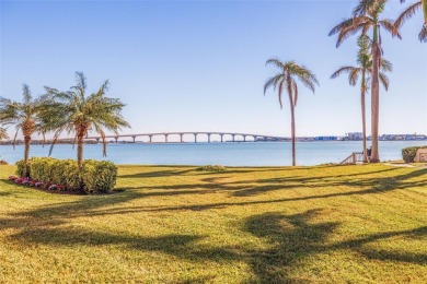 Enjoy panoramic vistas of the glistening bay from your private on Isla Del Sol Yacht and Country Club in Florida - for sale on GolfHomes.com, golf home, golf lot