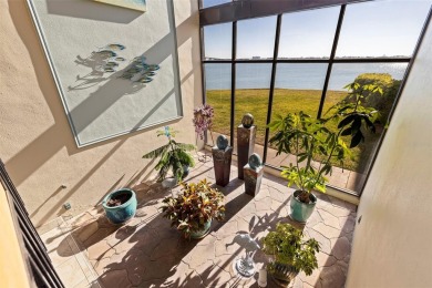 Enjoy panoramic vistas of the glistening bay from your private on Isla Del Sol Yacht and Country Club in Florida - for sale on GolfHomes.com, golf home, golf lot