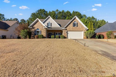 Beautifully maintained and move-in ready, this home is located on Canongate At Healy Point Country Club in Georgia - for sale on GolfHomes.com, golf home, golf lot