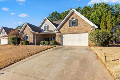 Beautifully maintained and move-in ready, this home is located on Canongate At Healy Point Country Club in Georgia - for sale on GolfHomes.com, golf home, golf lot