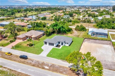 Live the Florida dream in this stunning 4-bedroom, 2-bathroom on Coral Oaks Golf Course in Florida - for sale on GolfHomes.com, golf home, golf lot