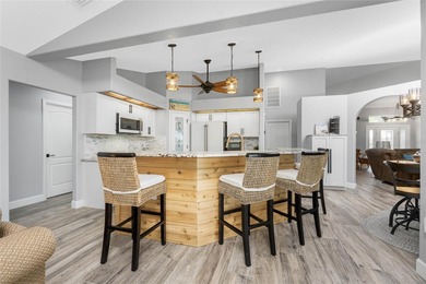 TURN-KEY, FULLY FURNISHED. IMPECCABLY REMODELED WITH DESIGNER on Rotonda Golf and Country Club The Palms Course in Florida - for sale on GolfHomes.com, golf home, golf lot