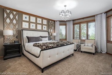 Welcome to 23790 Point O Woods Court - a stunning custom-built on River Bank Golf Course in Michigan - for sale on GolfHomes.com, golf home, golf lot