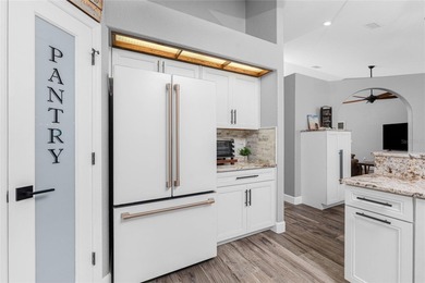 TURN-KEY, FULLY FURNISHED. IMPECCABLY REMODELED WITH DESIGNER on Rotonda Golf and Country Club The Palms Course in Florida - for sale on GolfHomes.com, golf home, golf lot