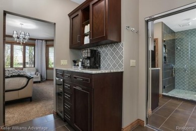 Welcome to 23790 Point O Woods Court - a stunning custom-built on River Bank Golf Course in Michigan - for sale on GolfHomes.com, golf home, golf lot