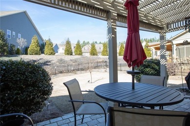 Welcome to easy, one-level living in this charming two-bedroom on Lanier Island Legacy Golf Couorse in Georgia - for sale on GolfHomes.com, golf home, golf lot