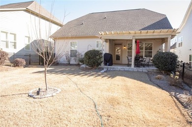 Welcome to easy, one-level living in this charming two-bedroom on Lanier Island Legacy Golf Couorse in Georgia - for sale on GolfHomes.com, golf home, golf lot