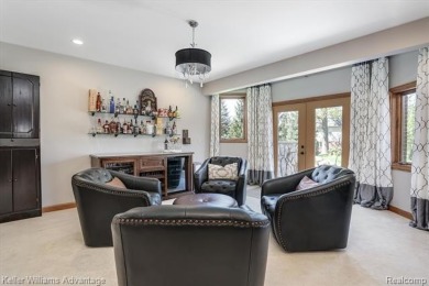 Welcome to 23790 Point O Woods Court - a stunning custom-built on River Bank Golf Course in Michigan - for sale on GolfHomes.com, golf home, golf lot