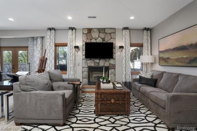 Welcome to 23790 Point O Woods Court - a stunning custom-built on River Bank Golf Course in Michigan - for sale on GolfHomes.com, golf home, golf lot