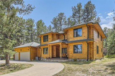 Nestled in the peaceful forest of Larkspur, CO, this mountain on The Golf Club At Bear Dance in Colorado - for sale on GolfHomes.com, golf home, golf lot