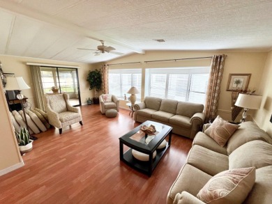 From the moment you walk through the door, you'll fall in love on Pine Lakes Country Club in Florida - for sale on GolfHomes.com, golf home, golf lot