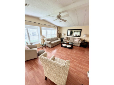 From the moment you walk through the door, you'll fall in love on Pine Lakes Country Club in Florida - for sale on GolfHomes.com, golf home, golf lot