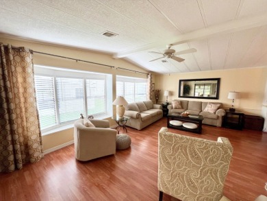 From the moment you walk through the door, you'll fall in love on Pine Lakes Country Club in Florida - for sale on GolfHomes.com, golf home, golf lot