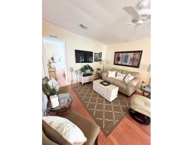 From the moment you walk through the door, you'll fall in love on Pine Lakes Country Club in Florida - for sale on GolfHomes.com, golf home, golf lot