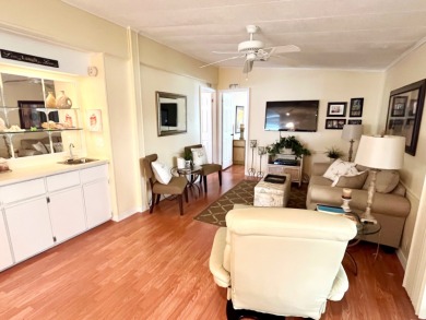 From the moment you walk through the door, you'll fall in love on Pine Lakes Country Club in Florida - for sale on GolfHomes.com, golf home, golf lot