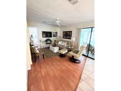 From the moment you walk through the door, you'll fall in love on Pine Lakes Country Club in Florida - for sale on GolfHomes.com, golf home, golf lot
