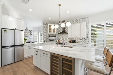 WELCOME HOME TO 3 MONTERREY DRIVE IN THE SOUGHT AFTER HAMMOCK on Hammock Dunes Club in Florida - for sale on GolfHomes.com, golf home, golf lot