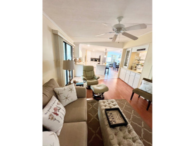 From the moment you walk through the door, you'll fall in love on Pine Lakes Country Club in Florida - for sale on GolfHomes.com, golf home, golf lot
