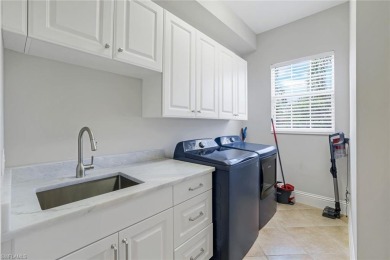 One of the finest second floor end-unit coach homes in Cascada on The Rookery At Marco in Florida - for sale on GolfHomes.com, golf home, golf lot