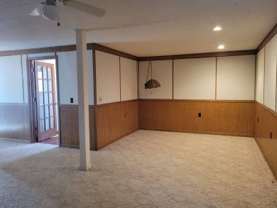 A well-kept split level home with 2 bedrooms on the main floor on Cooperstown Country Club in North Dakota - for sale on GolfHomes.com, golf home, golf lot