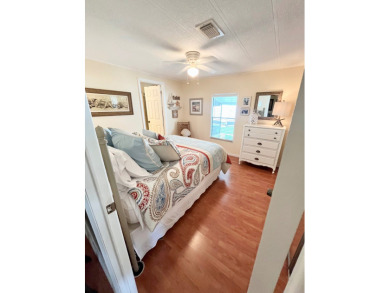 From the moment you walk through the door, you'll fall in love on Pine Lakes Country Club in Florida - for sale on GolfHomes.com, golf home, golf lot