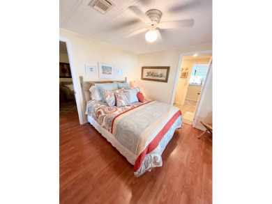 From the moment you walk through the door, you'll fall in love on Pine Lakes Country Club in Florida - for sale on GolfHomes.com, golf home, golf lot