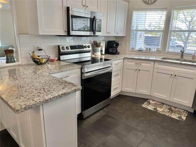 Under contract-accepting backup offers. No flooding! Stunning on Mangrove Bay Golf Course in Florida - for sale on GolfHomes.com, golf home, golf lot