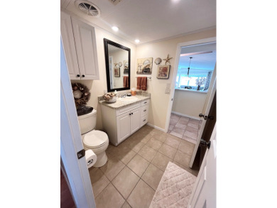 From the moment you walk through the door, you'll fall in love on Pine Lakes Country Club in Florida - for sale on GolfHomes.com, golf home, golf lot
