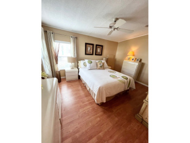 From the moment you walk through the door, you'll fall in love on Pine Lakes Country Club in Florida - for sale on GolfHomes.com, golf home, golf lot