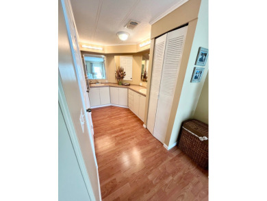 From the moment you walk through the door, you'll fall in love on Pine Lakes Country Club in Florida - for sale on GolfHomes.com, golf home, golf lot