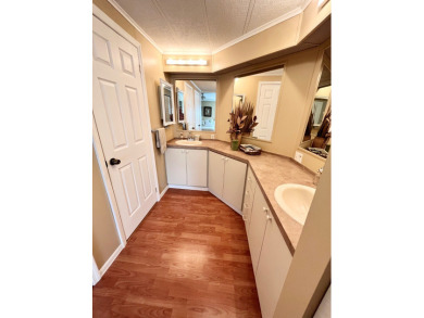 From the moment you walk through the door, you'll fall in love on Pine Lakes Country Club in Florida - for sale on GolfHomes.com, golf home, golf lot