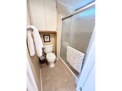 From the moment you walk through the door, you'll fall in love on Pine Lakes Country Club in Florida - for sale on GolfHomes.com, golf home, golf lot