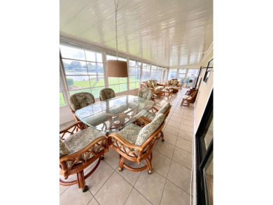 From the moment you walk through the door, you'll fall in love on Pine Lakes Country Club in Florida - for sale on GolfHomes.com, golf home, golf lot