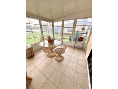 From the moment you walk through the door, you'll fall in love on Pine Lakes Country Club in Florida - for sale on GolfHomes.com, golf home, golf lot