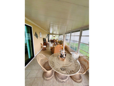 From the moment you walk through the door, you'll fall in love on Pine Lakes Country Club in Florida - for sale on GolfHomes.com, golf home, golf lot