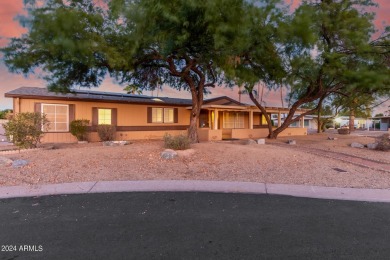 Extraordinarily upgraded 3 bed/2 bath on a large corner cul de on Sun Lakes Country Club in Arizona - for sale on GolfHomes.com, golf home, golf lot