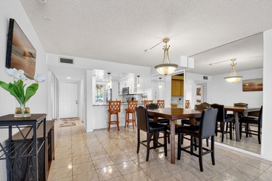 Beautiful first-floor condo with stunning lake and golf course on Bear Lakes Country Club in Florida - for sale on GolfHomes.com, golf home, golf lot