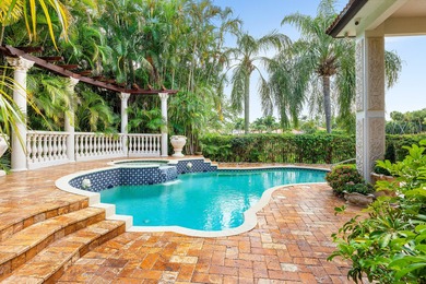 This exceptional 4 Bedroom, 4.1 Bath Home in Mizner Country Club on Mizner Country Club in Florida - for sale on GolfHomes.com, golf home, golf lot