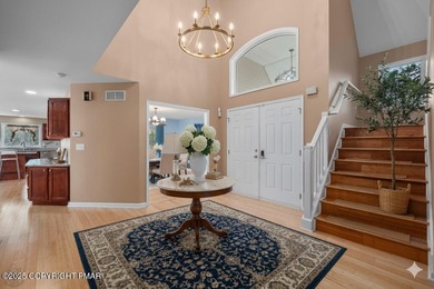 Welcome to your ultimate Poconos retreat!This magnificent on Country Club of the Poconos Golf Course in Pennsylvania - for sale on GolfHomes.com, golf home, golf lot