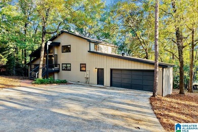 Spacious 1.5 story home with fully finished basement in the on Stillwaters Golf and Country Club in Alabama - for sale on GolfHomes.com, golf home, golf lot